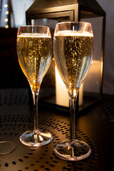 Two glasses of french sparkling wine champagne with little bubbles, New Year celebration, wedding or champagne tour with visit of caves, Reims, France