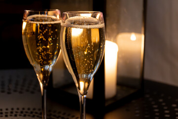 Two glasses of french sparkling wine champagne with little bubbles, New Year celebration, wedding or champagne tour with visit of caves, Reims, France