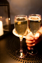 Two glasses of french sparkling wine champagne with little bubbles, New Year celebration, wedding or champagne tour with visit of caves, Reims, France