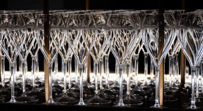 Many empty glasses for french sparkling wine champagne, cava, tasting of wine, bar, celebration, wedding or champagne tour with visit of caves, Reims, France