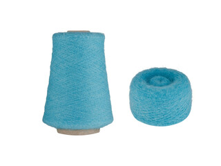 A Blue fluffy yarn set with a spool on a cardboard bobbin and a smaller ball, isolated on a white background. Ideal for knitting, crocheting, or craft projects, this fresh yarn adds a cool,