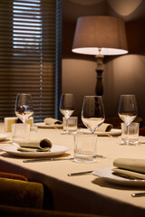 sophisticated wine setup, stylish wine presentation featuring graceful glassware and cozy lighting