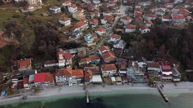 Aerial View of Trpejca Village on Lake Ohrid in North Macedonia on a Cloudy Day