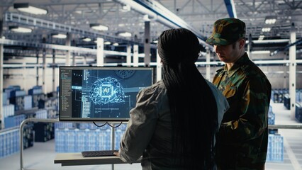 Army specialists in server room use advanced AI tools to review reconnaissance information....