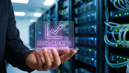 Rank tracking graph upward arrow digital analytics dashboard glowing hologram held by hand server room, data center environment, technology