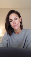 joyful remote professional, relaxed female professional engaging during virtual business meeting