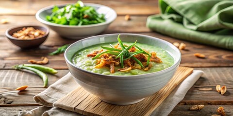 Delicious Creamy Green Vegetable Soup with Crispy Garnish in a Rustic Bowl