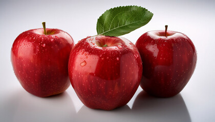 Red Apple Trio A Vibrant Arrangement Showcases Three Perfectly Ripe Red Apples Each Adorned With A Fresh Green Leaf Embodying The Essence Of Natural