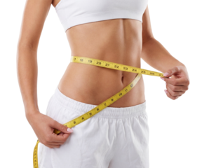 Fitness woman measuring her waist with tape measure on white or transparent background.