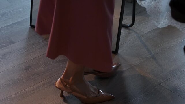 Veil Flowing Across Wooden Floor, Tulle Train And Lace Edging Sweeping Past Bridesmaid Shoe, Gentle Motion And Airy Texture Captured, Hands