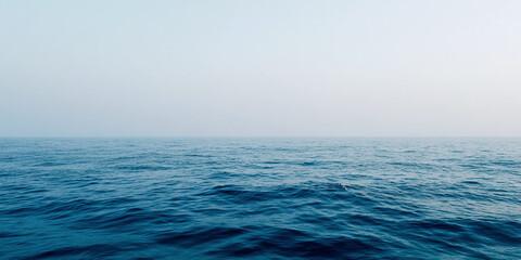 Obraz premium Calm ocean horizon with gentle waves under a soft, minimalist sky Generative AI