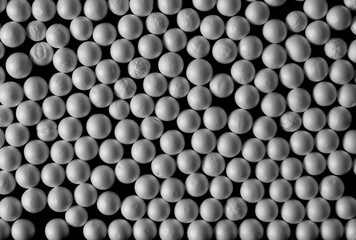 white circle styrofoam ball isolated on black background, pattern texture foam, clipping path