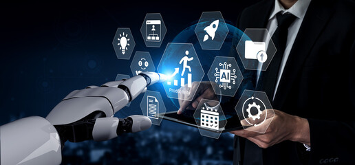A businessman engages with a robotic arm and digital icons, illustrating the blend of technology and human interaction in a modern corporate environment. Gantry