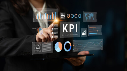 A business professional interacts with virtual KPI metrics and data analytics on a screen, showcasing performance evaluation and strategic insights for decision-making. Gantry