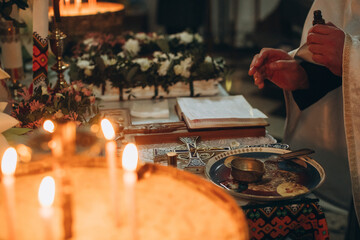 Priest preparing for orthodox baptism ceremony