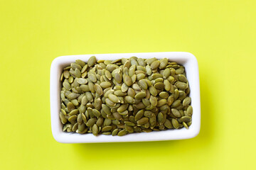 Delicious peeled green pumpkin seeds