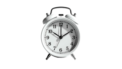 Close-up of a classic white alarm clock, hands pointing to 1000, against a black backdrop