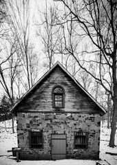 The historic Eli Whitney Boarding House, a Greek Revival home across the Town Bridge in Hamden, New Haven County, Connecticut, United States, a black and white photo