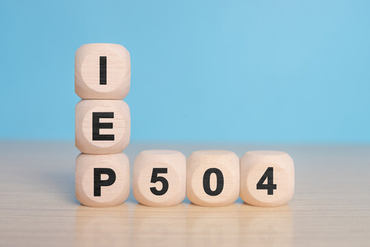 Individual education plan, Business concept, IEP 504 program, copy space, Text on natural wooden blocks