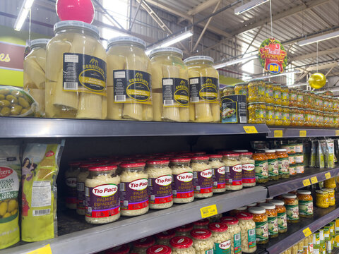 BELO HORIZONTE, MG, BRAZIL. DECEMBER 06, 2025. Supermarket Aisle with Jars of Preserved Palm Hearts and Pickled Vegetables