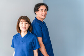 Obraz premium Medical workers in scrubs, medical staff, male and female doctors