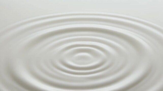 Smooth milk surface ripple texture symbolizing purity freshness and clean dairy background for food and beverage design.