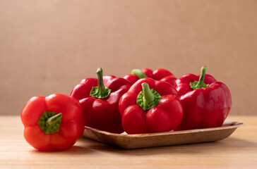 Red bell pepper or sweet pepper on wooden background