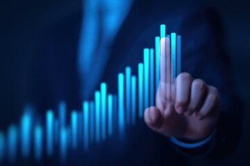 Blue business graph with hand touching screen for financial analysis and stock market data visualization representing growth and success in investment