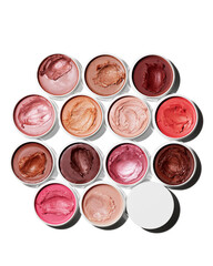 Vibrant makeup colors in sleek containers for beauty routines