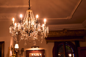 Colorful lighting in a classic space, for parties and celebrations. Colored lights, decorations, flowers, reflections, etc. to illuminate and dance on the dance floor.