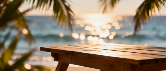 Empty wooden picnic table on a sun-drenched tropical beach, framed by swaying palm leaves with sparkling ocean and golden hour light, perfect for a tranquil getaway