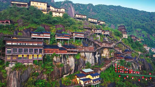 Beautiful ancient villages and traditional wooden buildings are built on the cliffs. The famous Wangxiang Valley Scenic Area is located in Jiangxi, China.