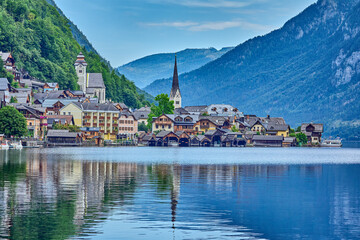 Hallstatt village with reflections located on the banks of the Hallstattersee lake located in the Salzkammergut region of Austria. Hallstatt is a UNESCO World Heritage Site, Hallstatt, Austria, Europe