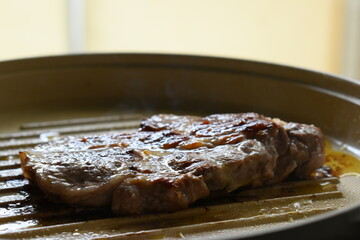 meat steak grill on pan in the kitchen