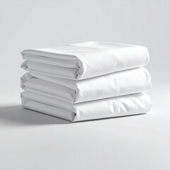 Stack of Neatly Folded White Bed Sheets and Pillowcases