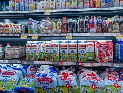 Canada, Quebec, 08 November 2025 : Colorful beverage cartons bottles and milk products on grocery store shelf