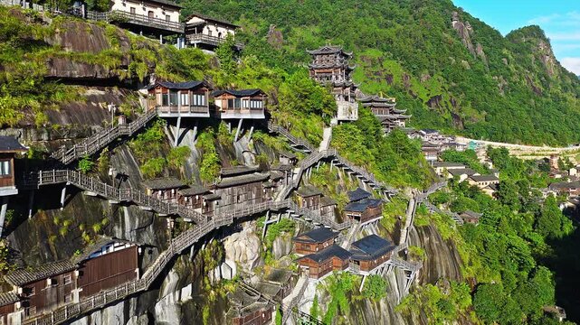 Beautiful ancient villages and traditional wooden buildings are built on the cliffs. The famous Wangxiang Valley Scenic Area is located in Jiangxi, China.