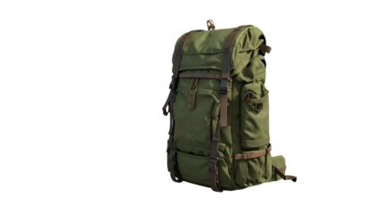 A green outdoor backpack with multiple compartments and straps, isolated on black