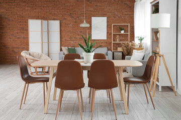 Plant on dining table in studio apartment