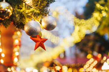 A Christmas tree at the festival market and romantic evening decorations