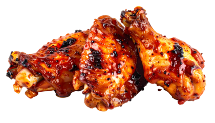 Close-up of three roasted chicken wings, glistening with a vibrant red sauce, perfectly charred with visible textures