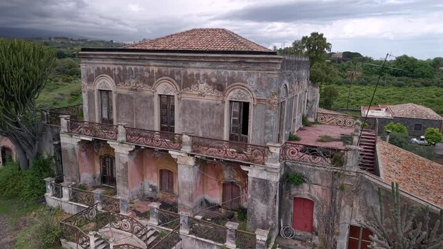 Facade Of The Abandoned Villa di Don Ciccio, Location Of Godfather Part II Film In Sicily, Italy. Aerial Close-up Orbit Shot
