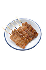 Thai BBQ Pork Skewers in plate isolated on white