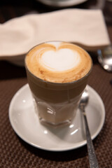 Hot fresh coffee latte serve on table