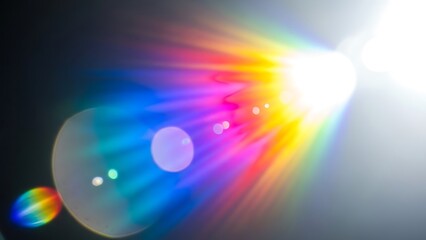 Bright colorful lens flare effect on dark background