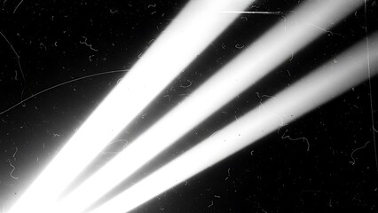 Abstract black and white light beams with vintage film grain overlay