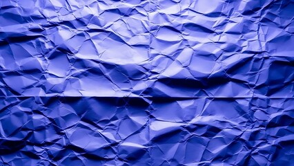 Abstract blue wrinkled paper texture background close up macro view