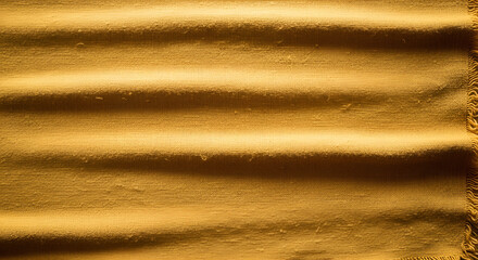 Textured Golden Fabric with Gentle Ripples and Soft Folds, Ideal for Luxurious Backgrounds