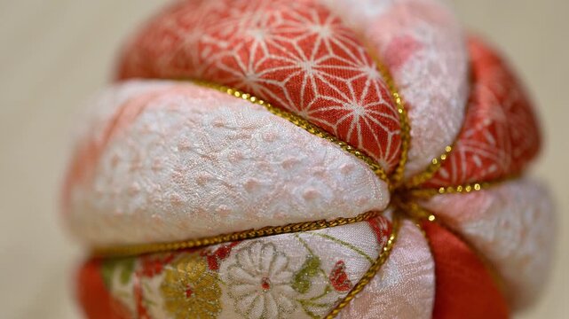 Traditional Japanese Temari Ball Close Up on Tatami Mat Center