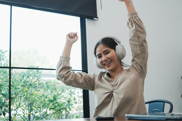 Overjoyed businesswoman happy for successful work.